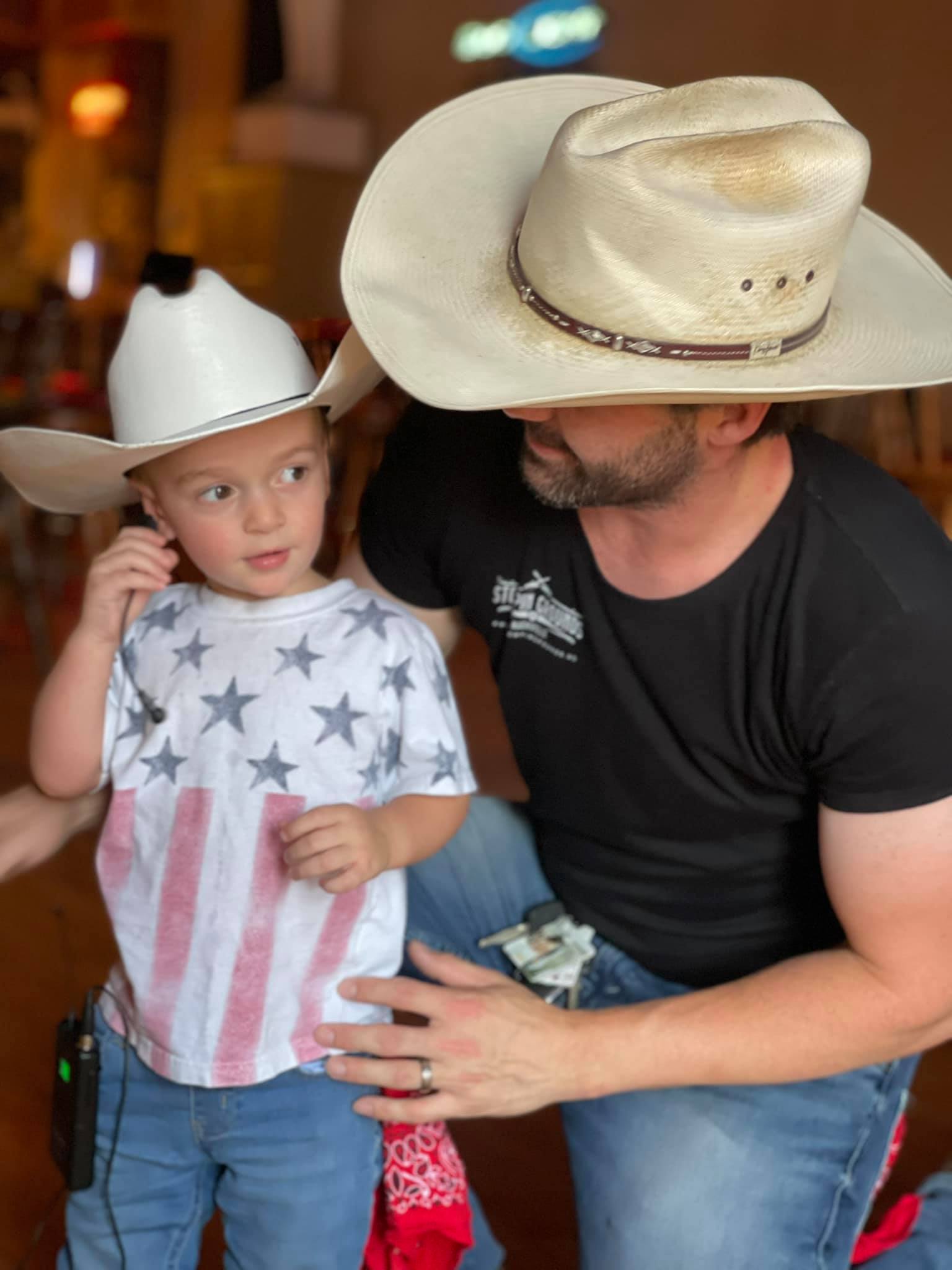 a small child wearing a hat