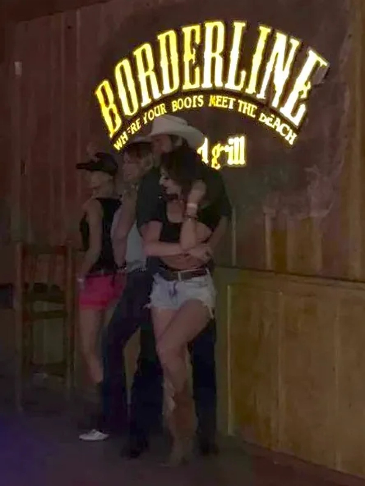 a woman holding a sign