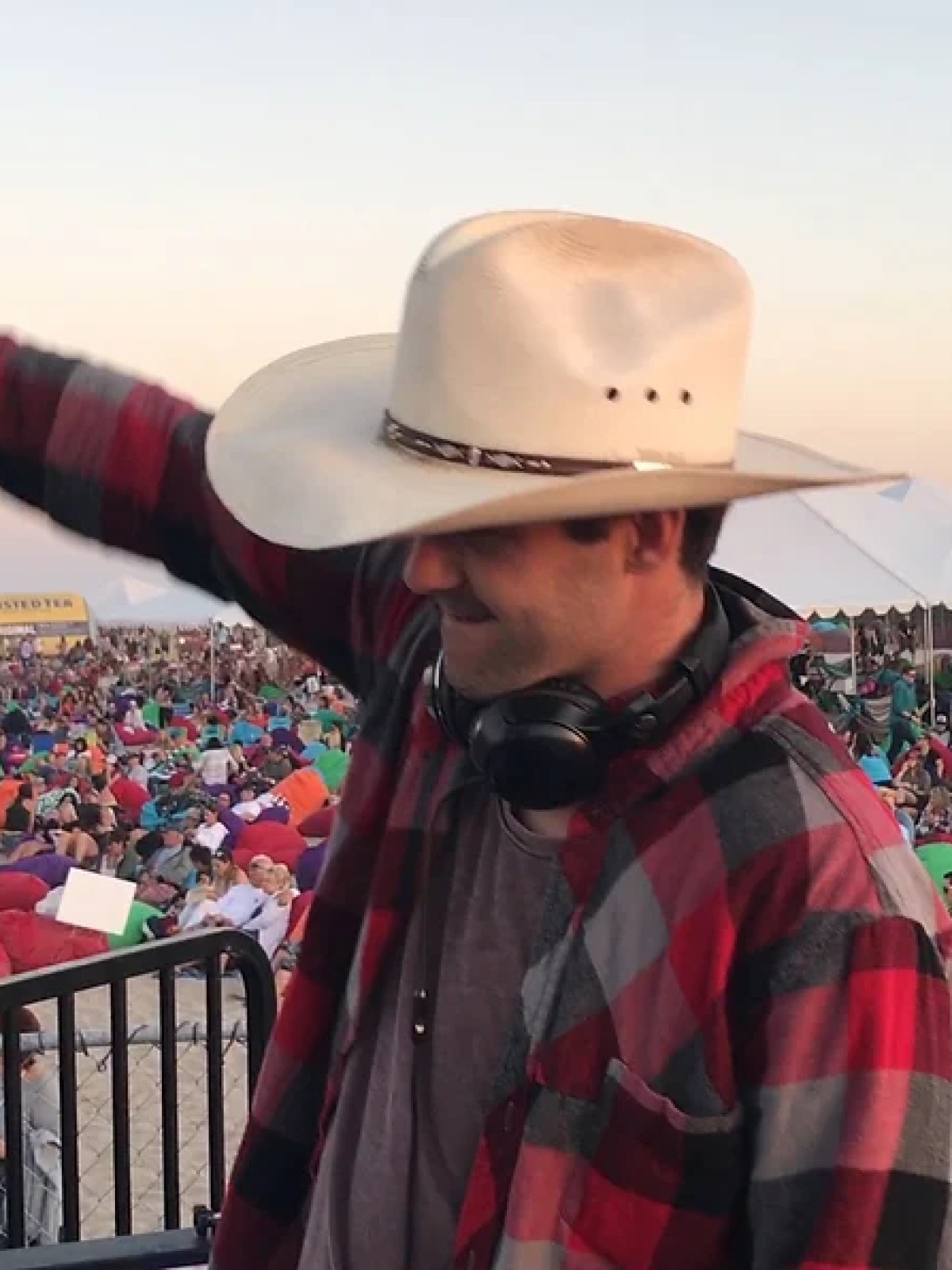 a man standing in front of a crowd