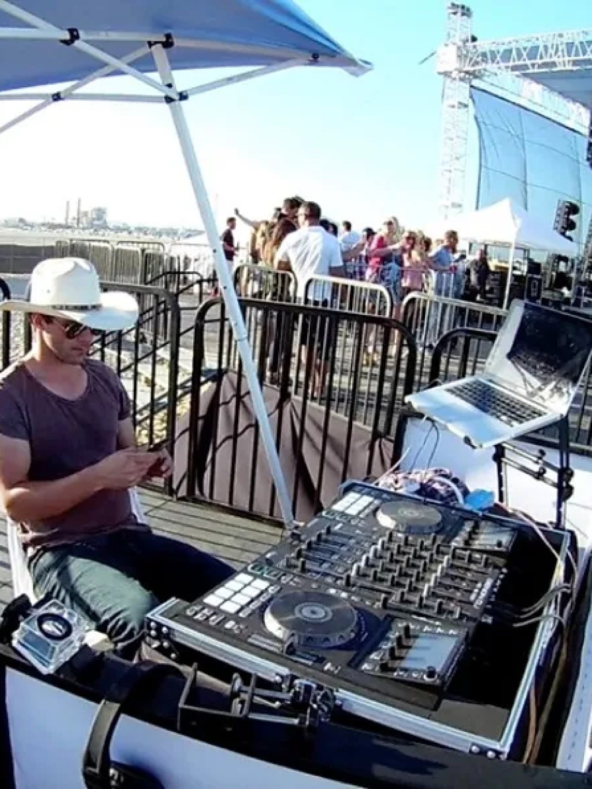 a person standing next to a boat