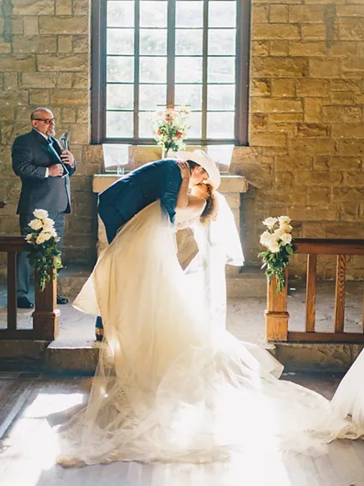 a statue in front of a brick building