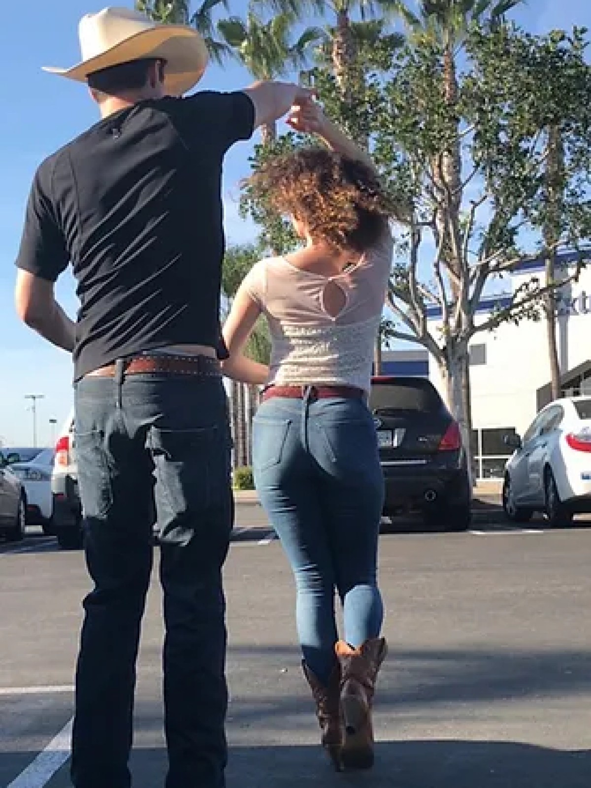 a person riding a skateboard up the side of a road