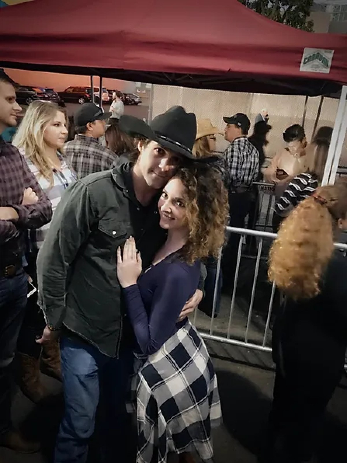 a person standing in front of a crowd of people