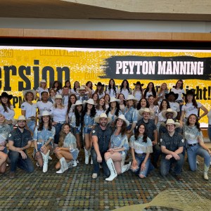 a group of people posing for a picture