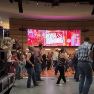 a group of people standing in a room