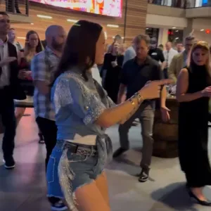 a group of people standing in a room