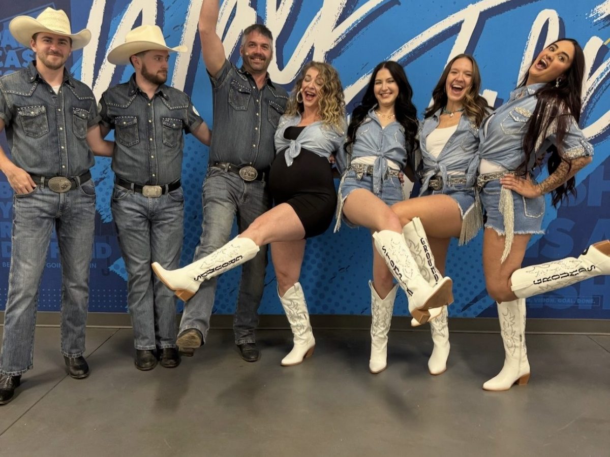 a group of people posing for the camera