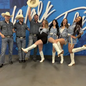 a group of people posing for the camera