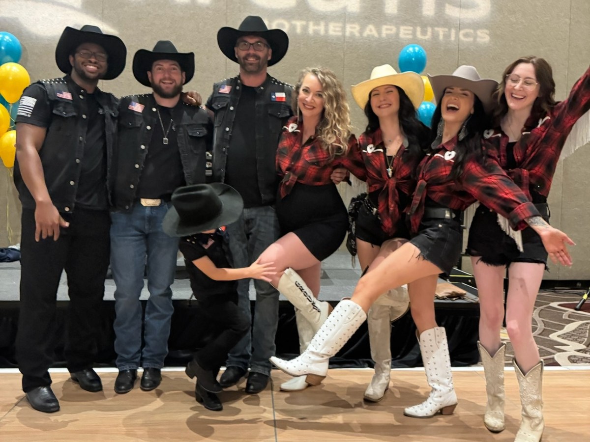 a group of people posing for the camera