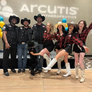 a group of people posing for the camera