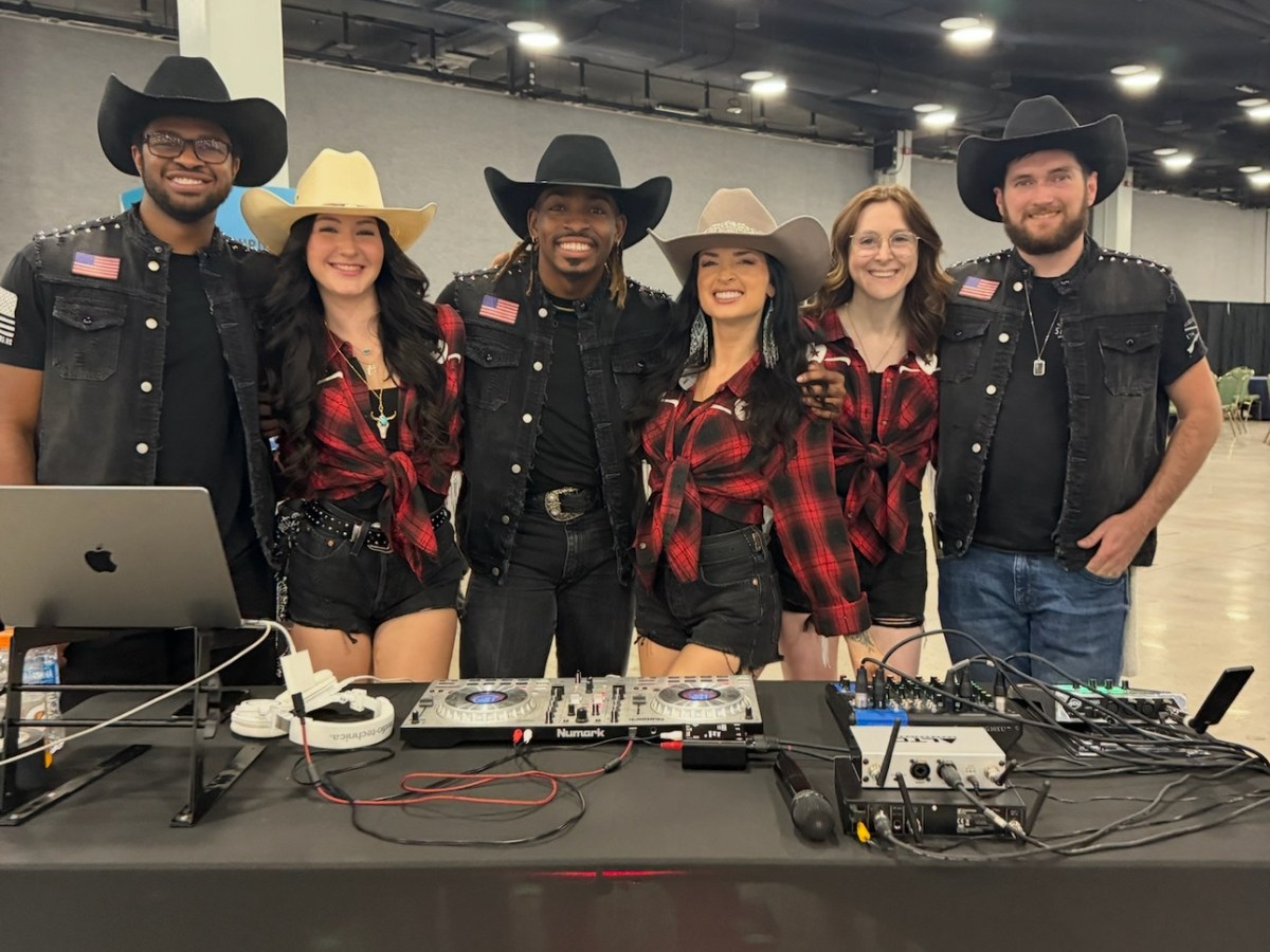 a group of people posing for the camera