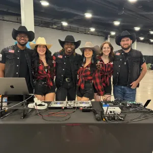 a group of people posing for the camera